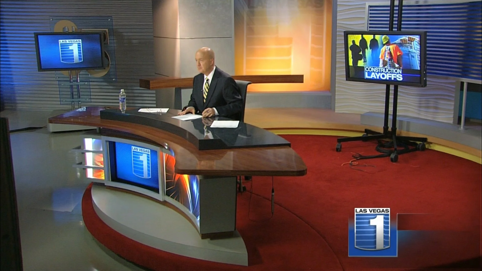 Studio wide-shot on set with Jeff Gillan, Construction Layoffs Graphic © 2009 KLAS-TV Las Vegas One News